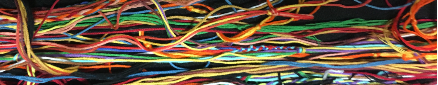 multi-coloured strands of thread